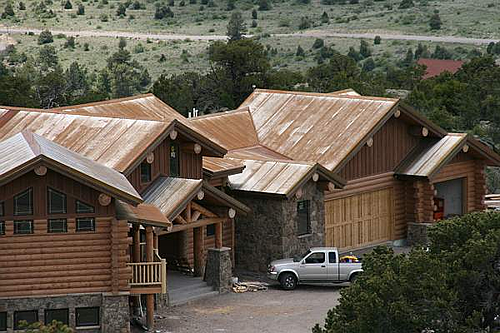 log cabin with metal roof